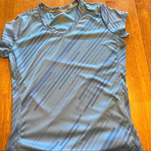 Nike Dri Fit  T-shirt in blues with a V neck